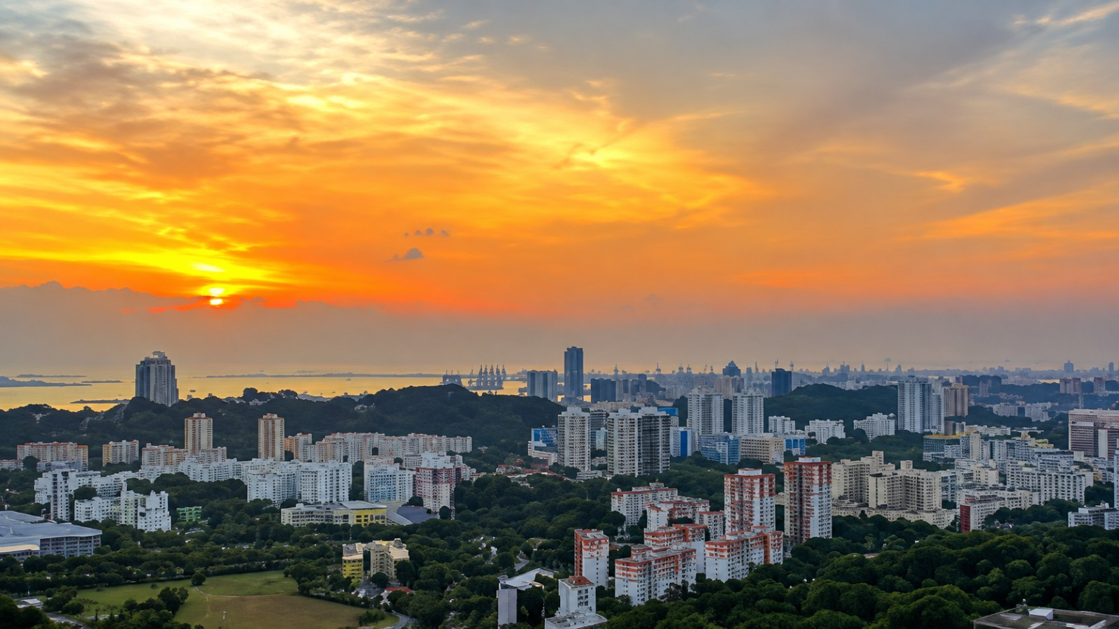 Singapore residential skyline at sunset during Hungry Ghost Month